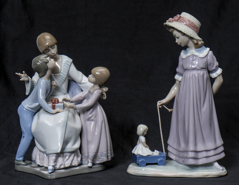 Appraisal: LLADRO PORCELAIN FIGURINES A GIFT OF LOVE Francisco Catala sculptor