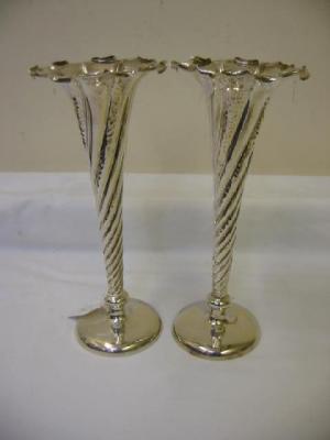 Appraisal: A PAIR OF VICTORIAN VASES of spiral fluted trumpet form