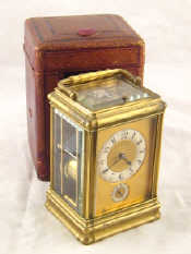 Appraisal: A brass cased French carriage clock with alarm and repeater