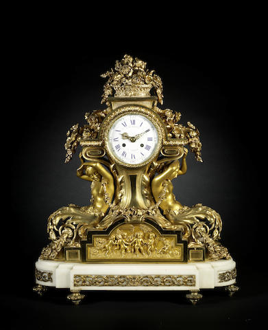 Appraisal: A large French late th century gilt-bronze and white marble