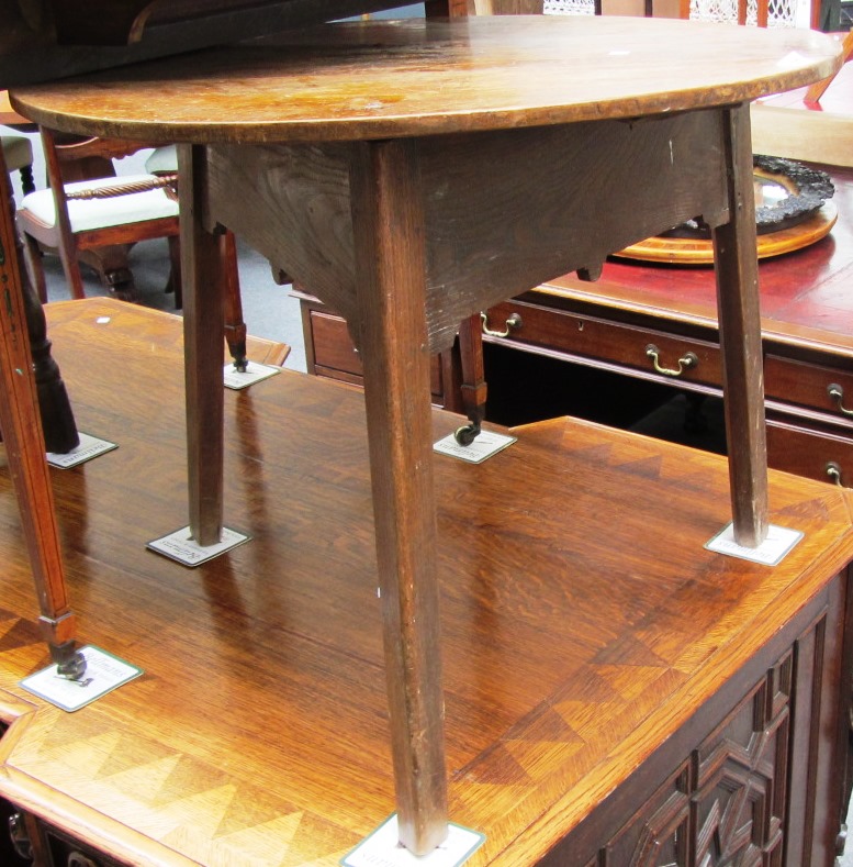 Appraisal: An th century and later oak cricket table on three