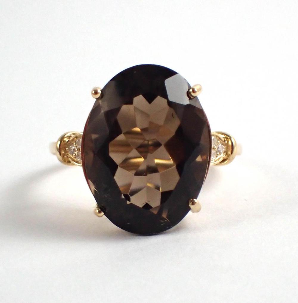 Appraisal: SMOKY QUARTZ DIAMOND AND FOURTEEN KARAT GOLD RING with three