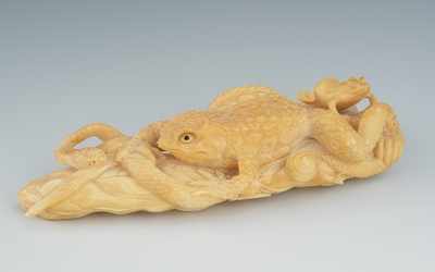 Appraisal: A Carved Ivory Toad Snake and Slug Okimono Finely carved