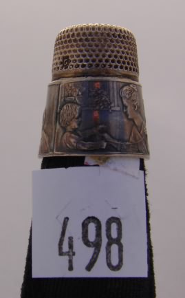 Appraisal: German sterling thimble with mother and child scene