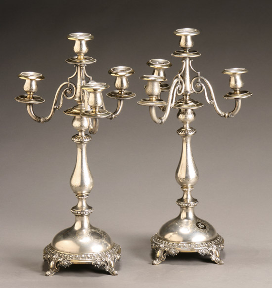 Appraisal: Pair of Continental Parcel-Gilt Silver Convertible Four-Light Candelabra Last Quarter