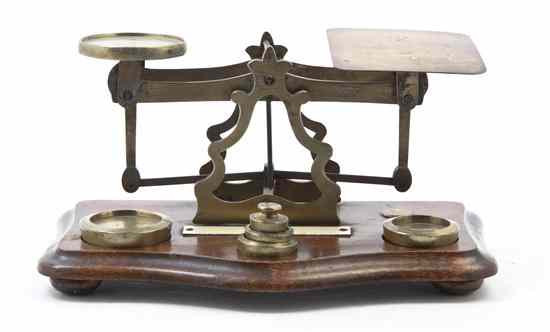 Appraisal: An English Brass Postage Scale of typical form with graduated