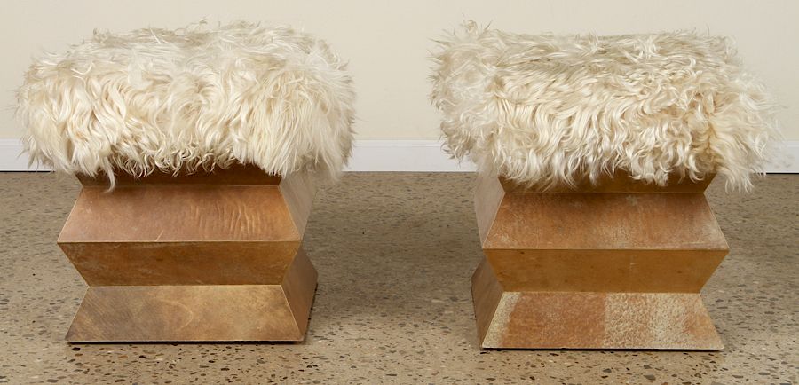 Appraisal: PATAGONIA GOAT COVERED BENCHES PARCHMENT BASES A pair of Patagonia