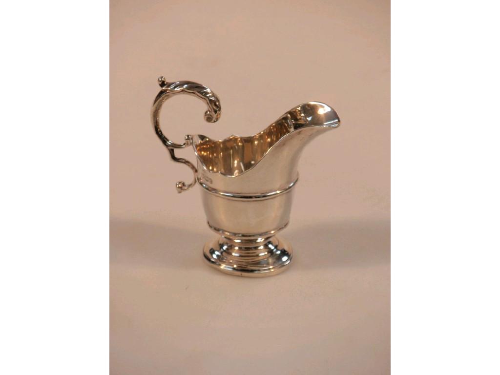 Appraisal: A George V silver small helmet cream jug by Thomas