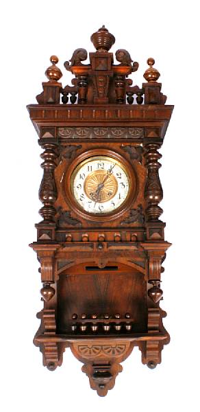 Appraisal: A German carved walnut wall regulator height in width in