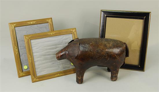 Appraisal: THREE LEATHER FRAMES and a LEATHER FIGURE OF A PIG