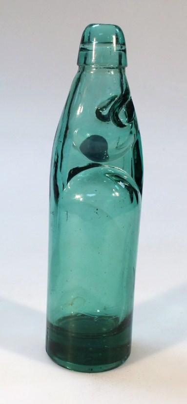 Appraisal: A green glass lemonade bottle with blue marble stopper cm