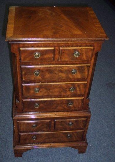 Appraisal: A George II style miniature chest on chest cm high