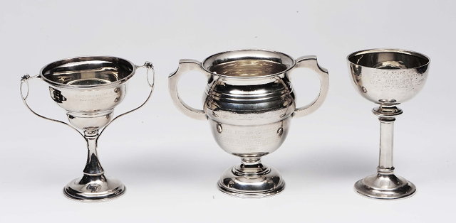 Appraisal: A collection of three pieces of silverincluding two trophies and