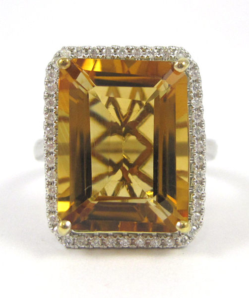 Appraisal: CITRINE DIAMOND AND FOURTEEN KARAT GOLD RING The white gold