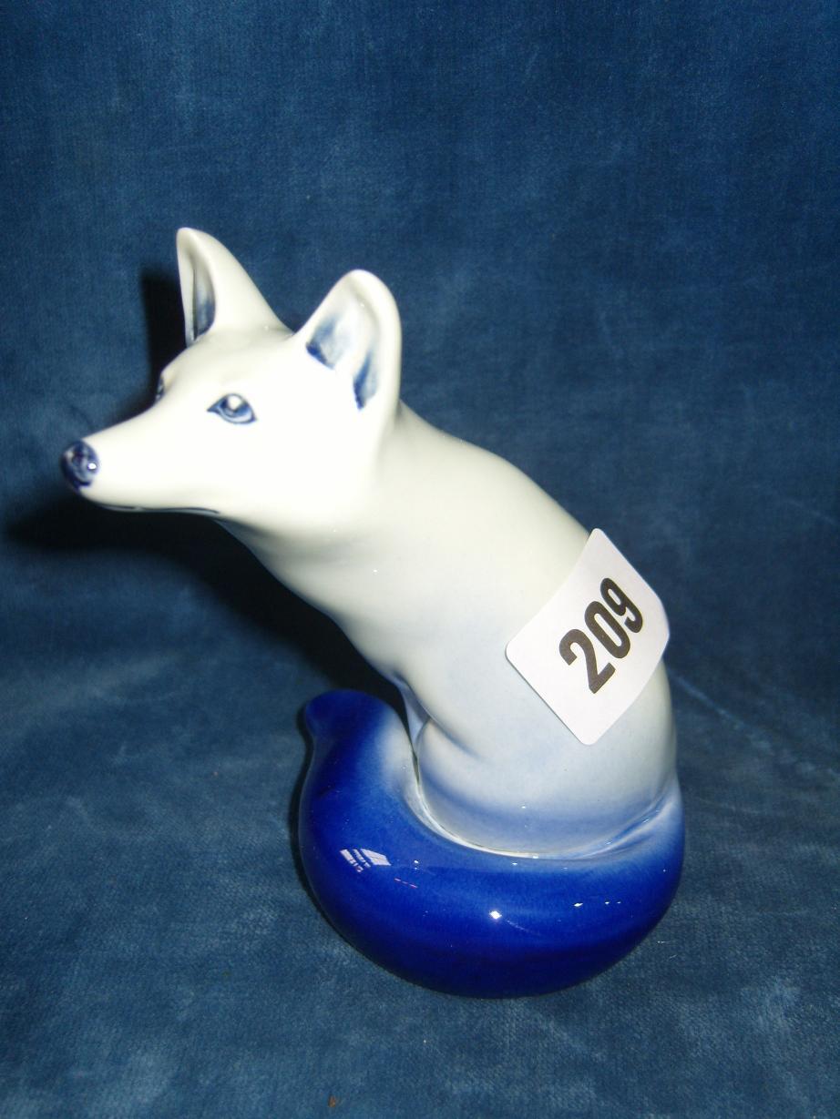 Appraisal: A Royal Doulton model of a blue flambe seated fox