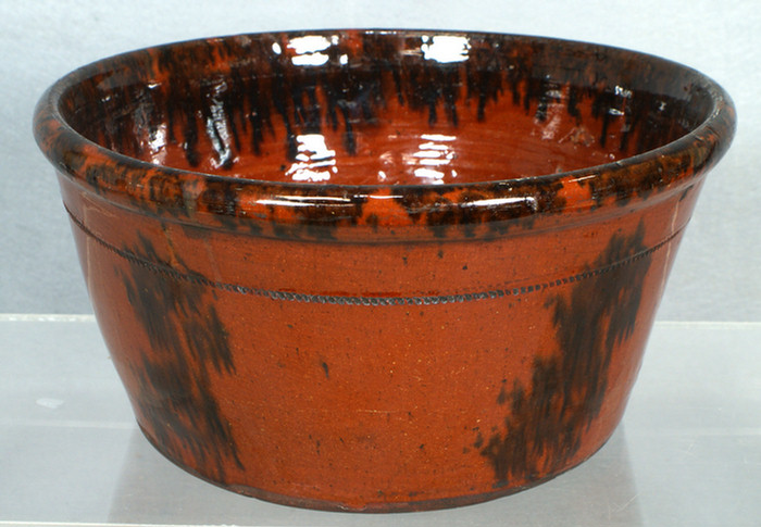 Appraisal: Glazed redware basin with manganese decoration small glaze flakes d