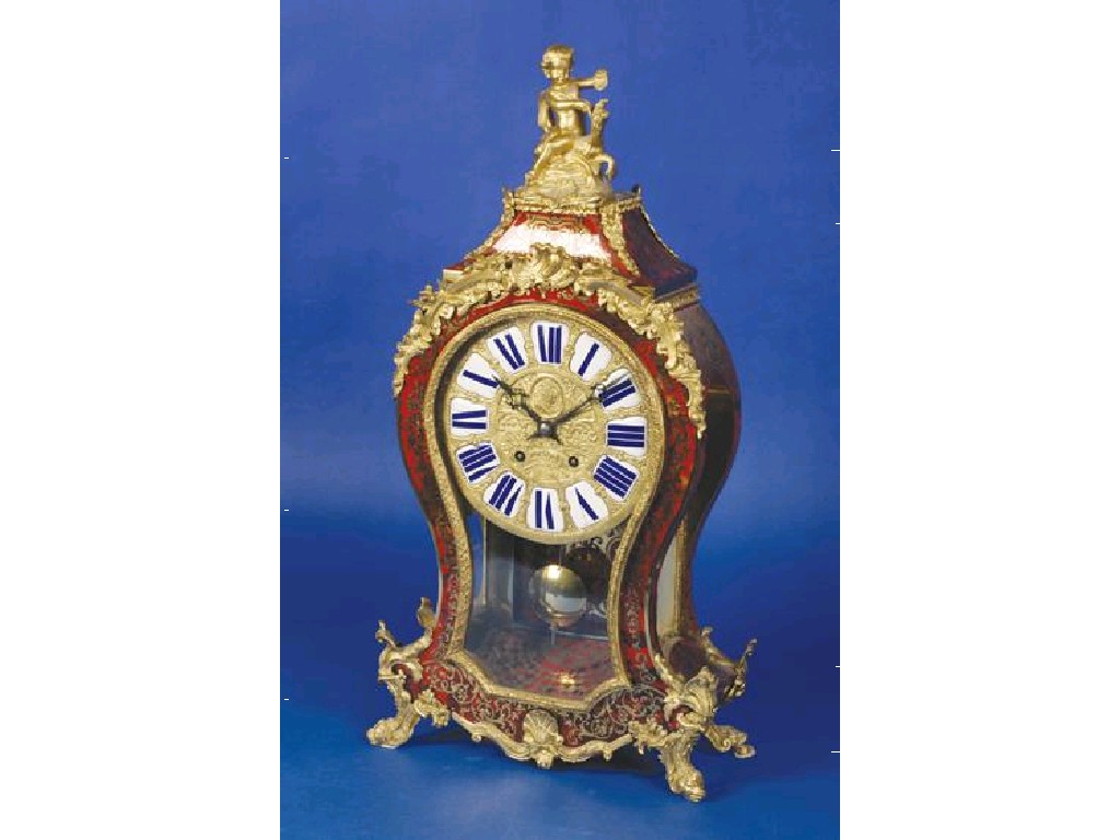 Appraisal: A LOUIS XV STYLE BOULLE CARTOUCHE-SHAPED MANTEL CLOCK the gilt