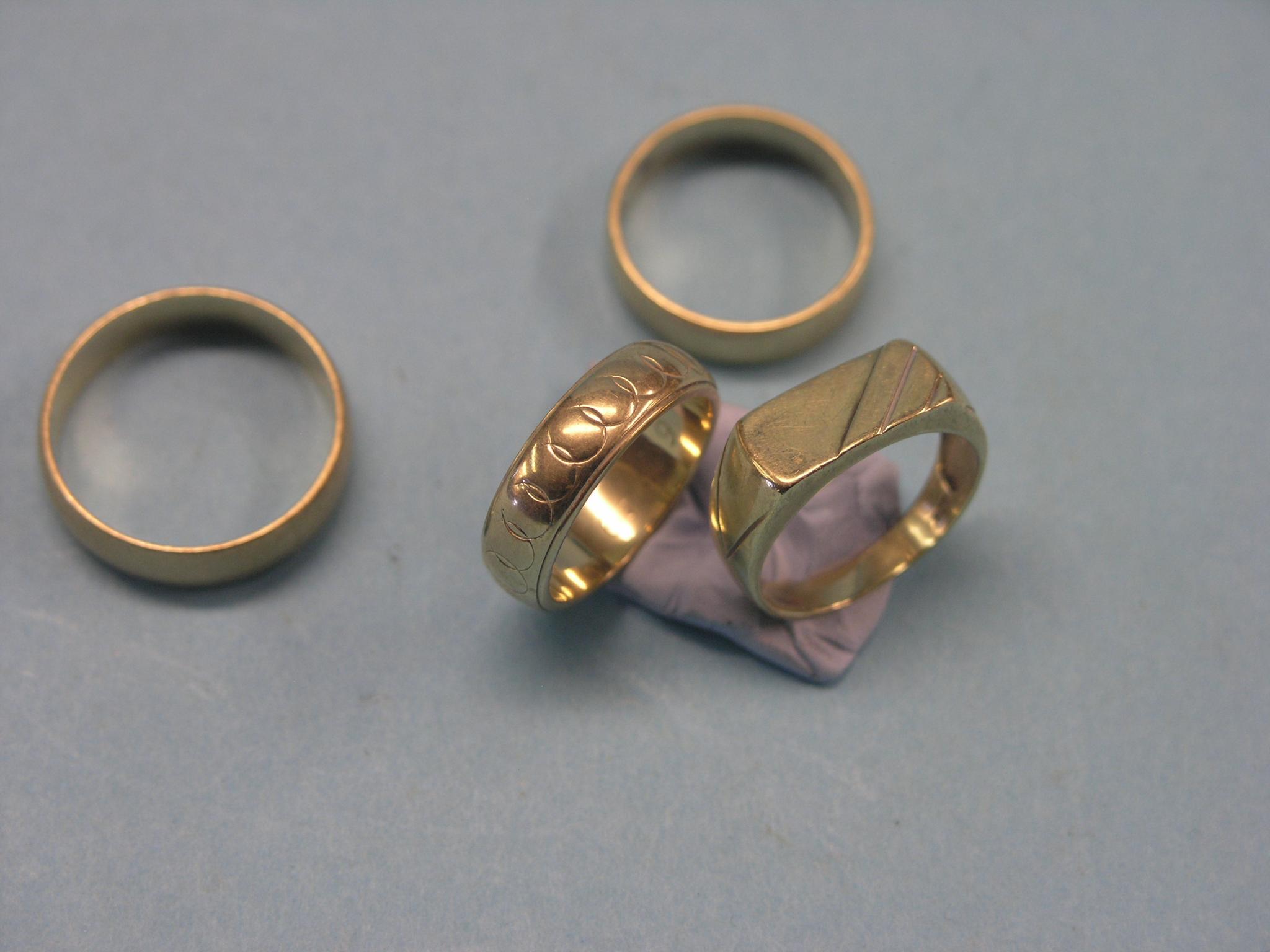 Appraisal: Four various ct gold band wedding rings grams total