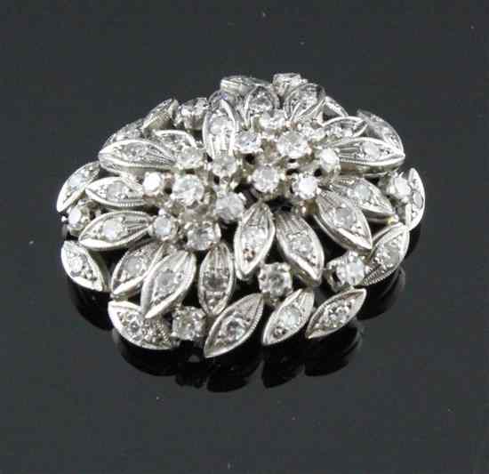 Appraisal: An ct and white gold diamond cluster of foliate design