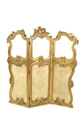 Appraisal: An Edwardian carved giltwood three fold screen in Rococo style