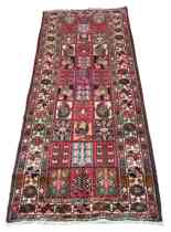 Appraisal: A Baktiari Carpet This Baktiari garden panel carpet features thirty-three