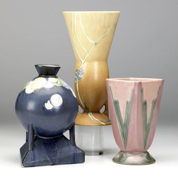 Appraisal: ROSEVILLE Futura three vases flaring with flowers restored small chip