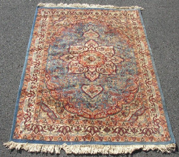 Appraisal: Oriental area rug Handwoven wool Blue ground MEASUREMENTS ' x