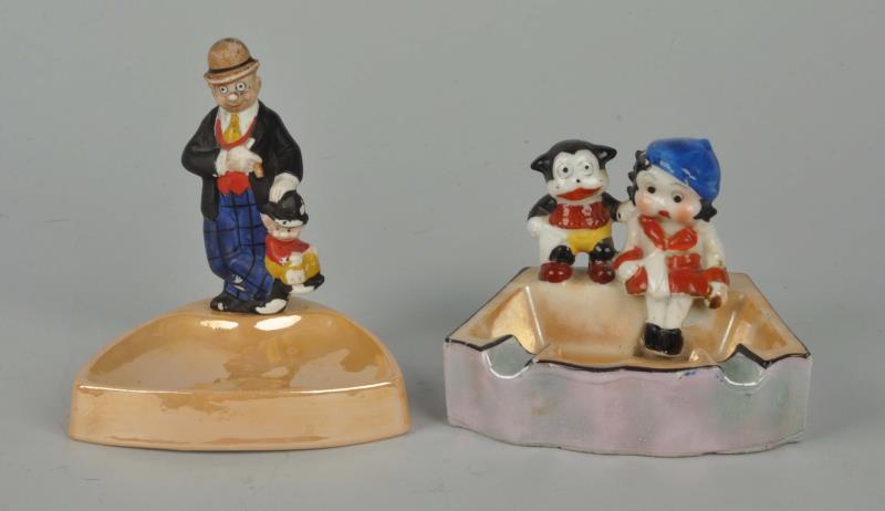 Appraisal: Lot Of Ceramic Character Ashtrays This lot includes a Moon