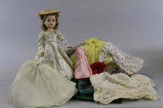 Appraisal: MADAME ALEXANDER WALKER AND ACCESSORIES Hard plastic walker with miscellaneous