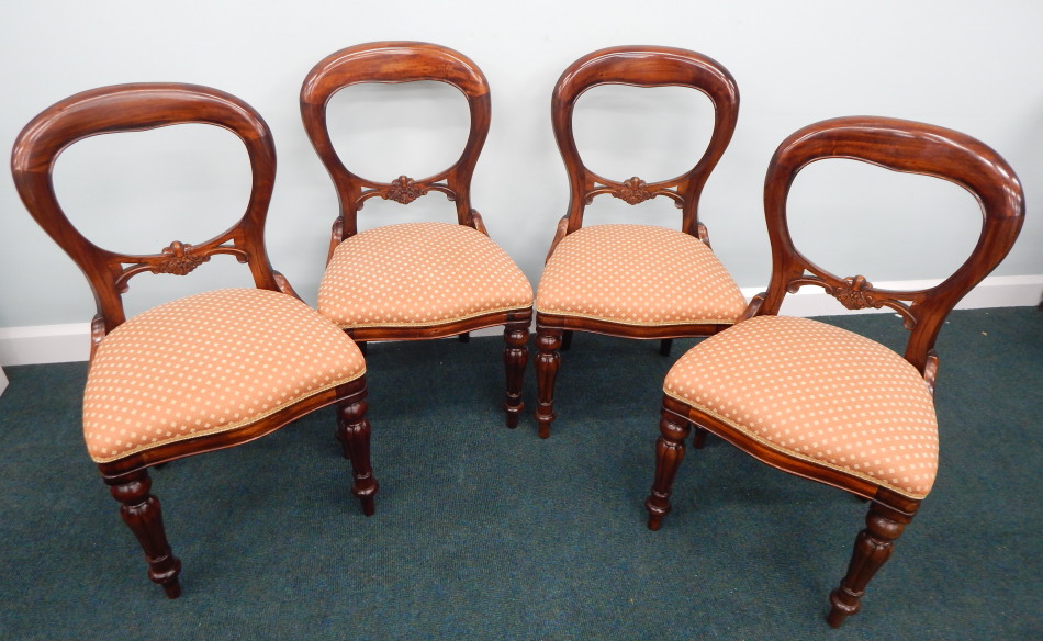 Appraisal: A set of four Victorian style mahogany balloon back chairs