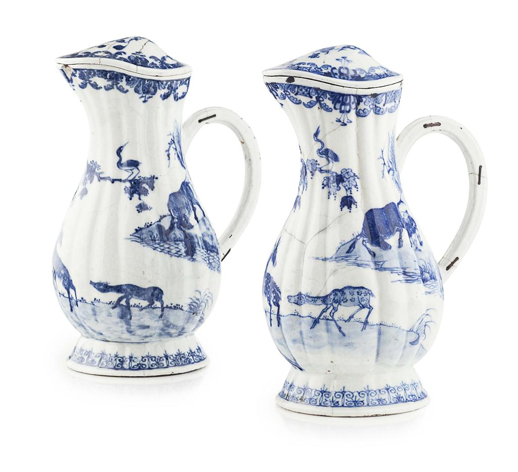 Appraisal: PAIR OF CHINESE EXPORT BLUE AND WHITE PORCELAIN COVERED EWERS