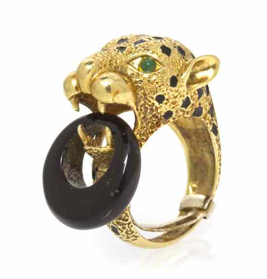 Appraisal: A Yellow Gold Onyx and Emerald Panther Ring in a