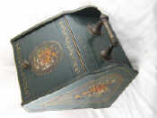 Appraisal: A painted decorated coal scuttle with brass bar handle x