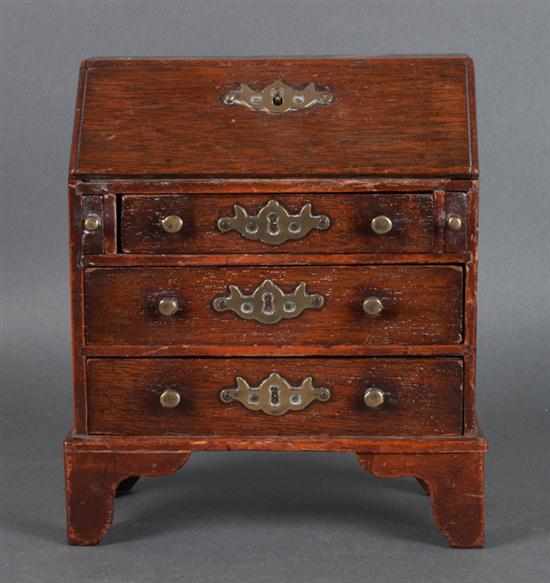 Appraisal: Chippendale style oak miniature slant-front desk th century fitted interior