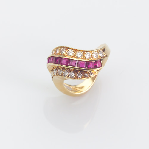 Appraisal: DIAMOND AND RUBY Ring in k yellow gold S curved