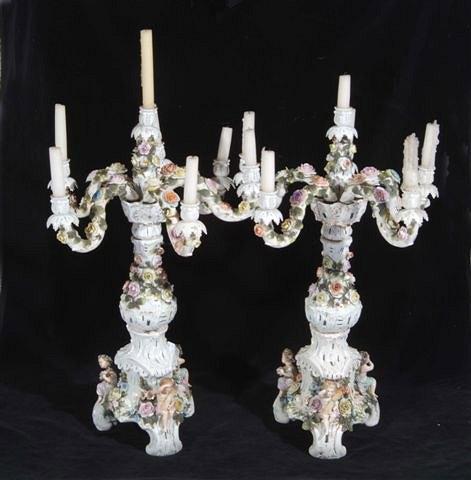 Appraisal: A PAIR OF SITZENDORF TYPE CANDELABRA each with putti and