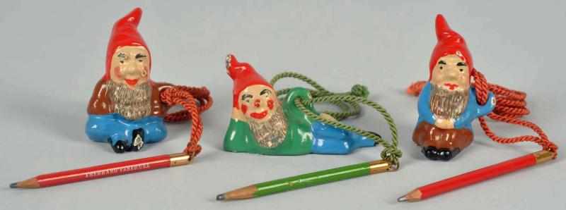 Appraisal: Lot of Cast Iron Gnome Figural Paperweights Includes original rope