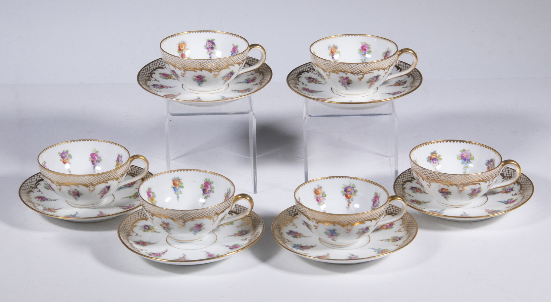 Appraisal: DRESDEN PORCELAIN CUPS SAUCERS German Hand Painted Demitasse Cup Saucer