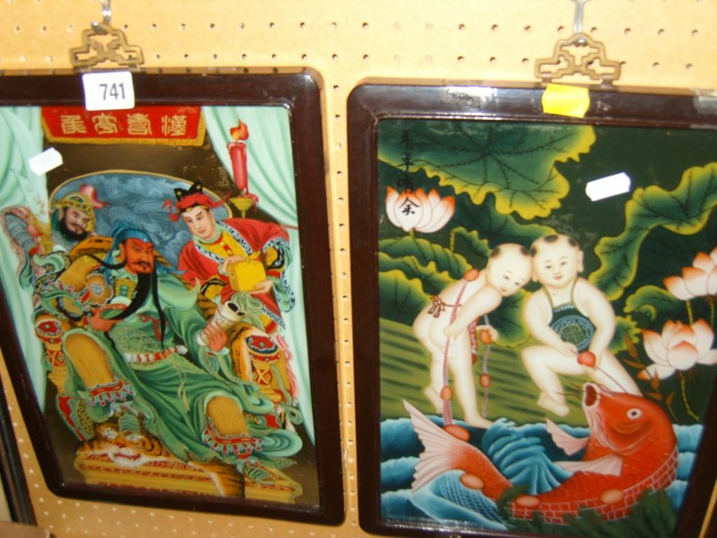 Appraisal: A pair of oriental paintings on glass panels one showing