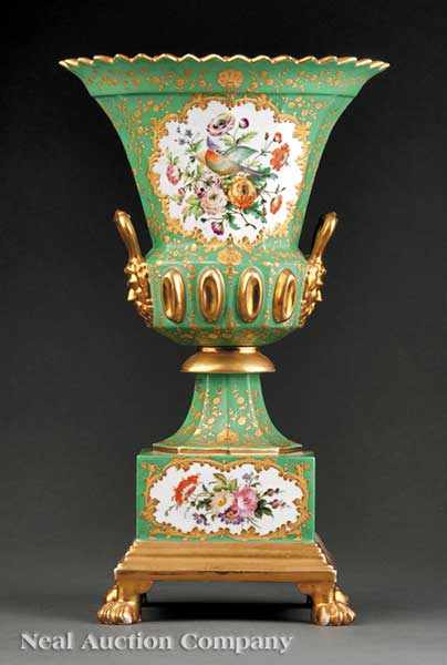 Appraisal: A French Gilt and Polychrome Porcelain Urn in the style