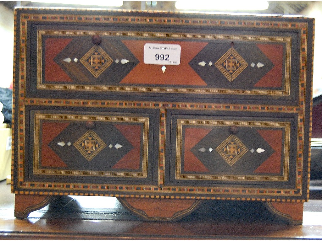 Appraisal: An Islamic inlaid table-top chest of three drawers th century