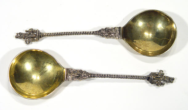 Appraisal: Pair of brass commemorative spoons with figural decoration and twisted