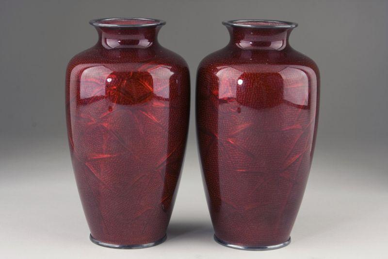 Appraisal: Pair of Japanese Red Cloisonne Silver Vases unsigned with toned