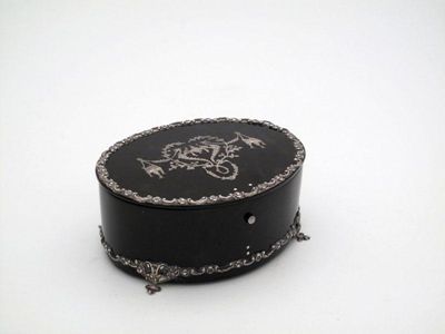 Appraisal: A silver mounted tortoiseshell trinket box by Henry and Albert