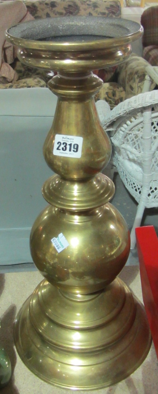 Appraisal: A brass pricket candlestick