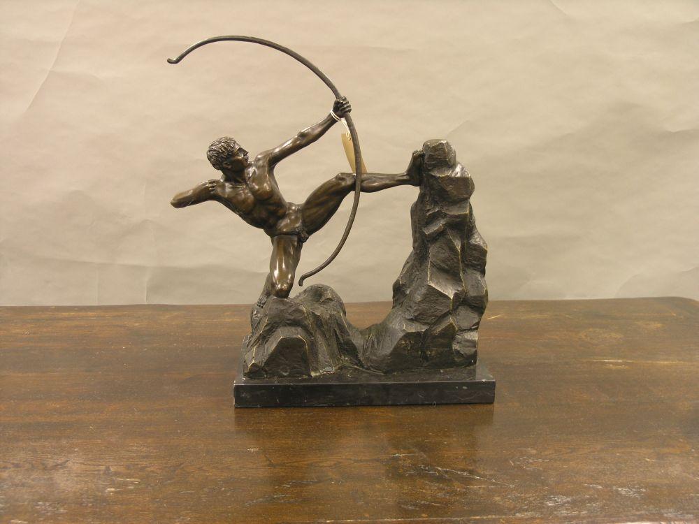 Appraisal: A classical bronze figure of an archer nude male preparing