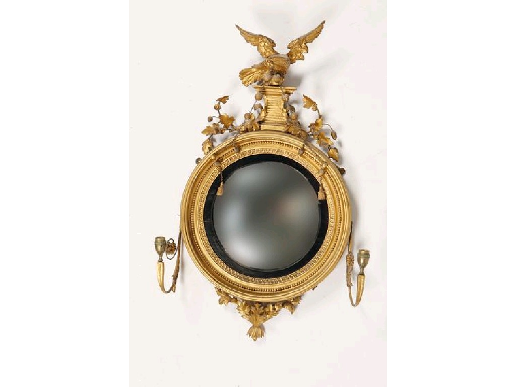 Appraisal: A REGENCY GILT FRAMED CONVEX WALL MIRROR the circular plate