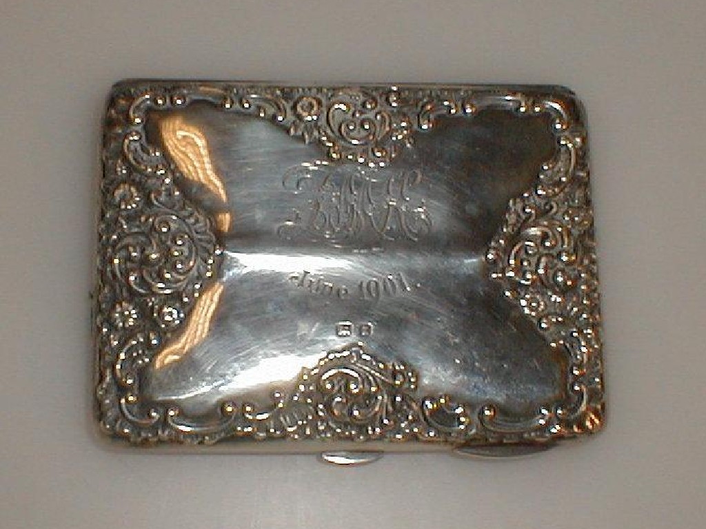 Appraisal: A Victorian silver card case purse Art Nouveau scrolling and