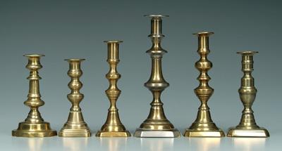 Appraisal: Six push-up style brass candlesticks th century - in to