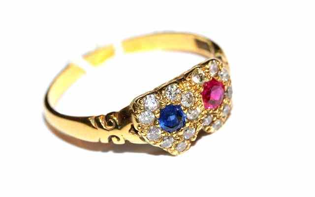 Appraisal: A SAPPHIRE RUBY AND DIAMOND DRESS RING in the form